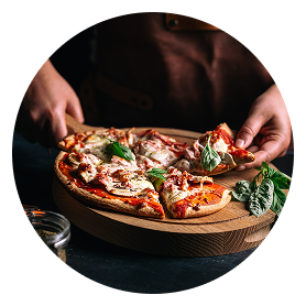 Person serving a slice of pizza.
